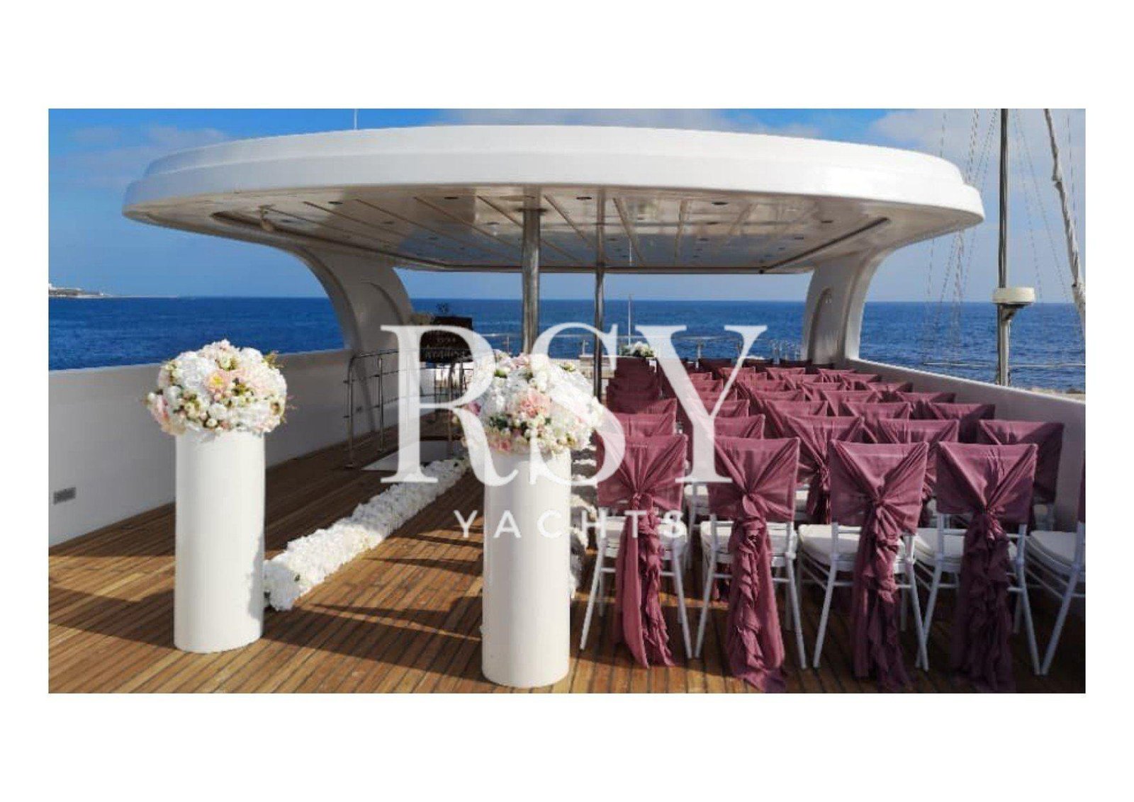 Catering setup for wedding yacht rental Dubai with guest seating.